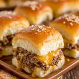 A plate of cheeseburger sliders.